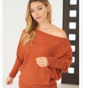 Beautiful brand new cropped sweater top .